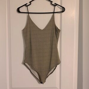 Black white and yellow striped bodysuit. Worn once. Women’s medium